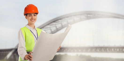 Image of Construction engineer with draft against bridge outdoors. Banner design