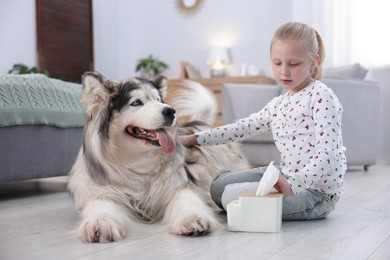 Photo of Girl suffering from allergy with her dog at home