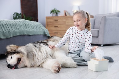 Photo of Girl suffering from allergy with her dog at home