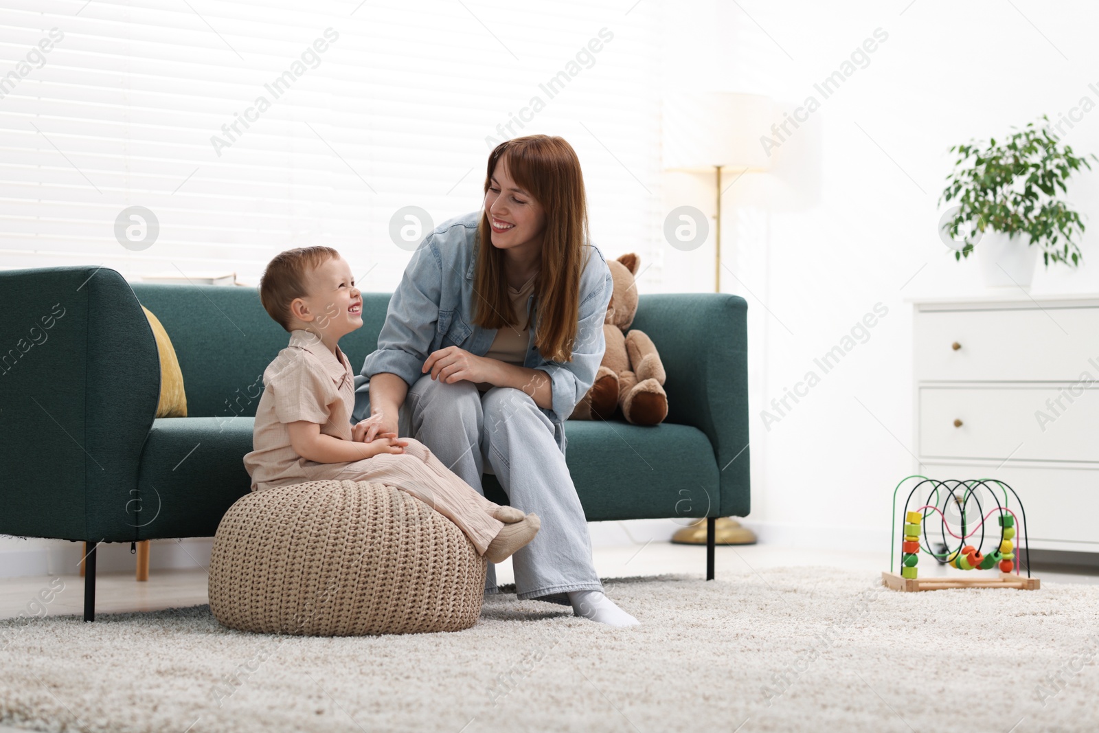 Happy mother spending time together with her son at home Photo of Happy mother spending time together with her son at home