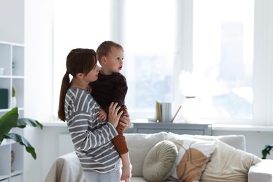 Photo of Mother spending time together with her son at home