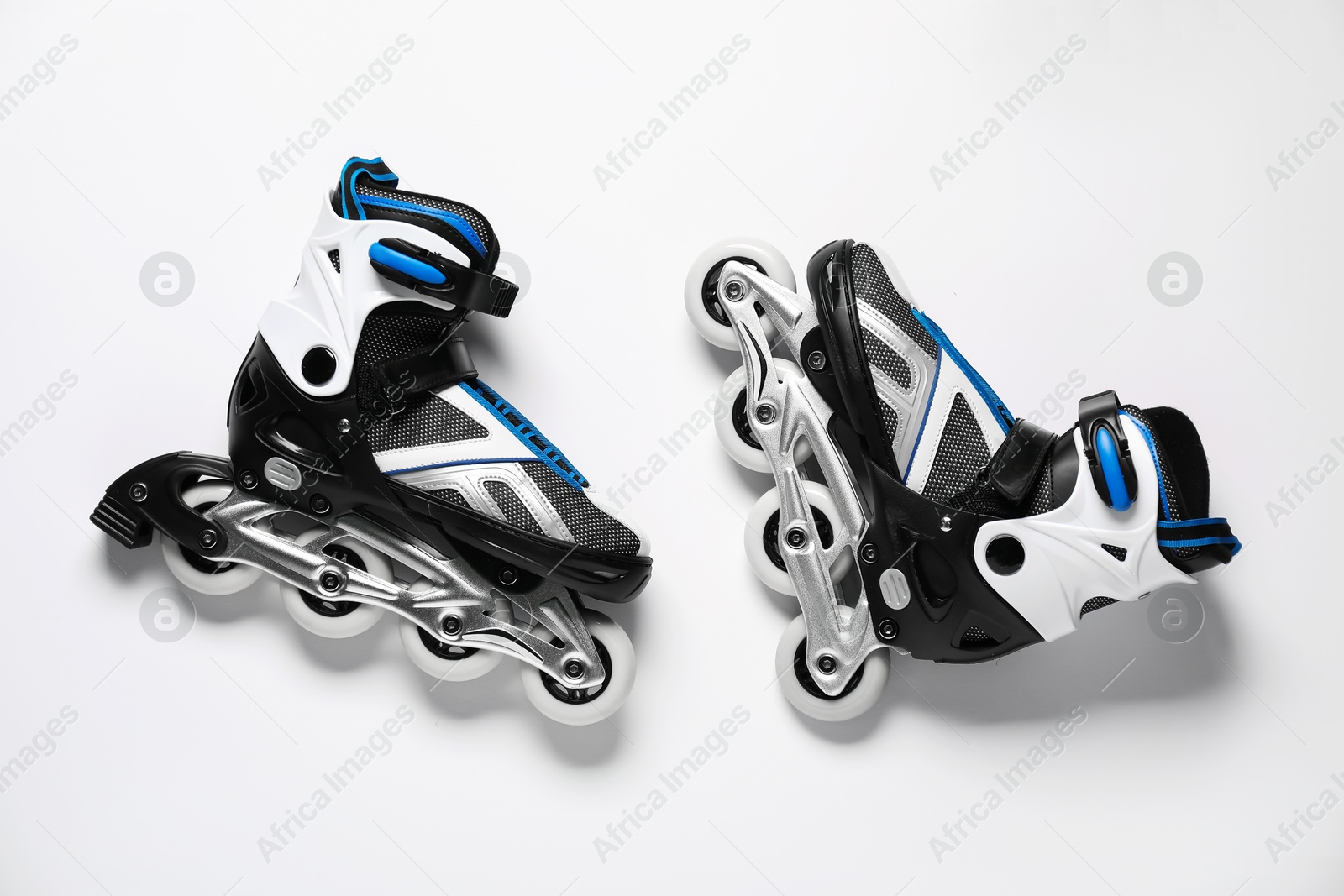 Pair of roller skates on white background, top view Photo of Pair of roller skates on white background, top view
