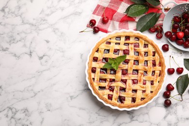 Photo of Tasty cherry pie and berries on white marble table, flat lay. Space for text