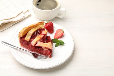 Photo of Piece of tasty strawberry pie and berries on white wooden table, space for text