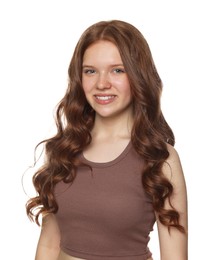 Photo of Portrait of smiling teenage girl with healthy wavy hair on white background