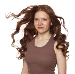 Photo of Portrait of beautiful teenage girl with healthy wavy hair on white background