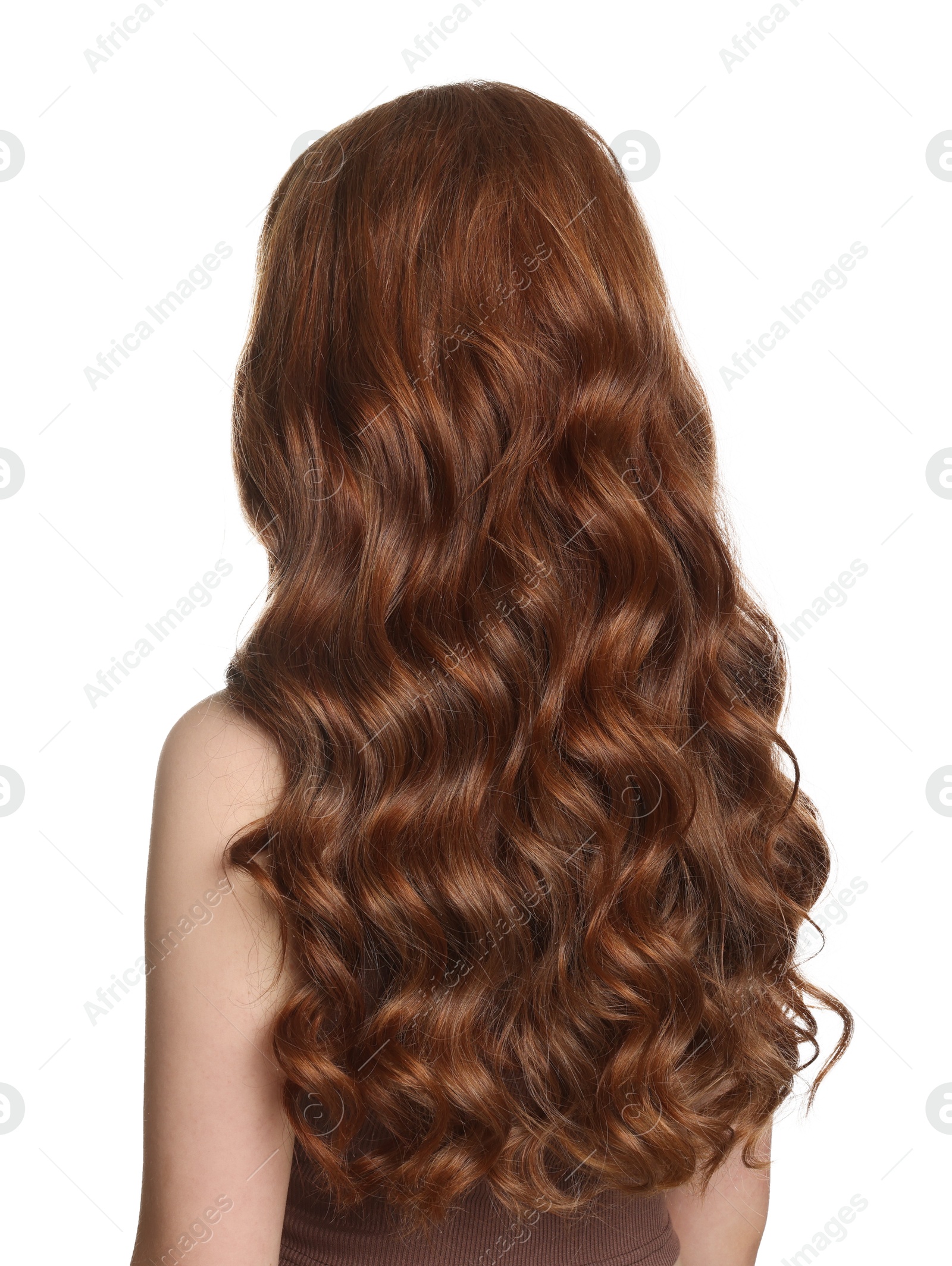 Teenage girl with healthy wavy hair on white background Photo of Teenage girl with healthy wavy hair on white background