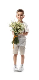 Photo of Cute little boy with bouquet of beautiful chamomile flowers on white background
