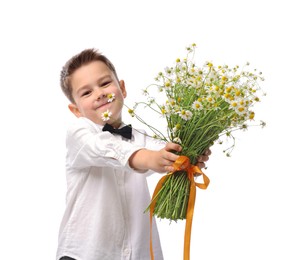 Photo of Cute little boy giving bouquet of beautiful chamomile flowers on white background