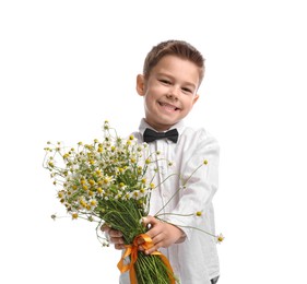 Photo of Smiling little boy giving bouquet of beautiful chamomile flowers on white background