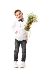 Photo of Smiling little boy giving bouquet of beautiful chamomile flowers on white background