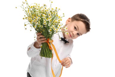Photo of Cute little boy with bouquet of beautiful chamomile flowers on white background