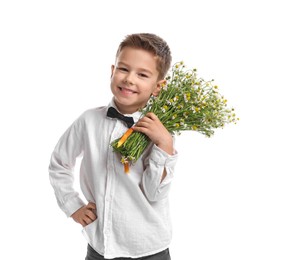 Photo of Smiling little boy with bouquet of beautiful chamomile flowers on white background