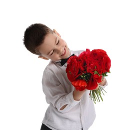 Photo of Smiling little boy with bouquet of beautiful flowers on white background