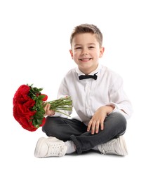 Photo of Smiling little boy with bouquet of beautiful flowers on white background