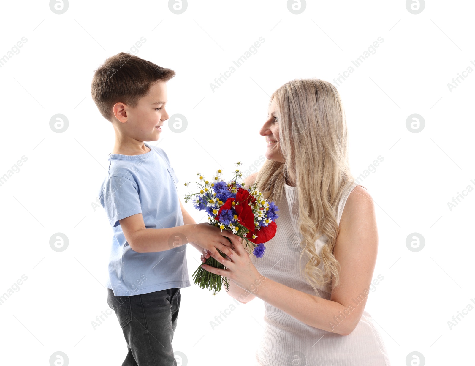 Little boy presenting bouquet of beautiful flowers to his smiling mother on white background Photo of Little boy presenting bouquet of beautiful flowers to his smiling mother on white background