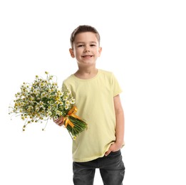Photo of Smiling little boy with bouquet of beautiful chamomile flowers on white background