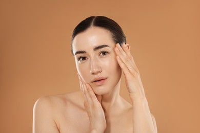 Photo of Beautiful woman after spa treatment on beige background