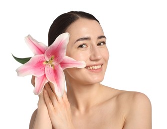 Photo of Portrait of smiling woman with lily flower after spa treatment on white background, closeup