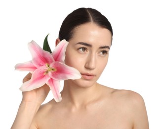 Photo of Beautiful woman with lily flower after spa treatment on white background, closeup