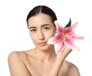 Photo of Portrait of beautiful woman with lily flower after spa treatment on white background, closeup