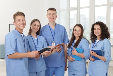 Photo of Group of medical students in uniforms indoors