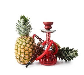 Photo of Red traditional hookah and pineapples isolated on white