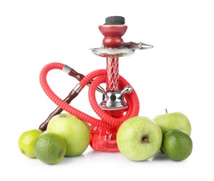 Photo of Red traditional hookah, apples and limes isolated on white