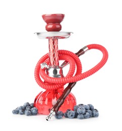 Photo of Red traditional hookah and blueberries isolated on white