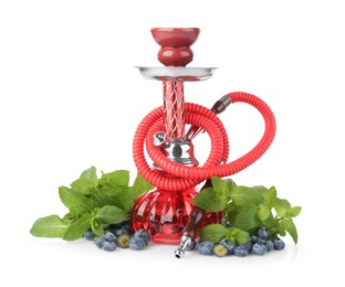 Photo of Red traditional hookah, blueberries and mint isolated on white
