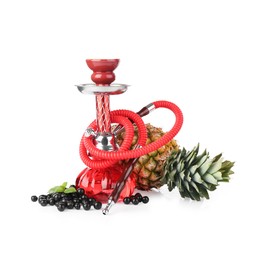 Photo of Red traditional hookah, pineapple, black currants and mint isolated on white