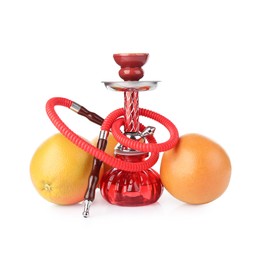 Photo of Red traditional hookah and grapefruits isolated on white