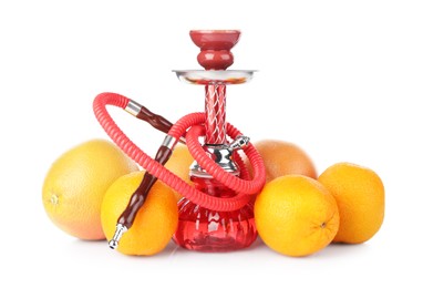Photo of Red traditional hookah, grapefruits and oranges isolated on white