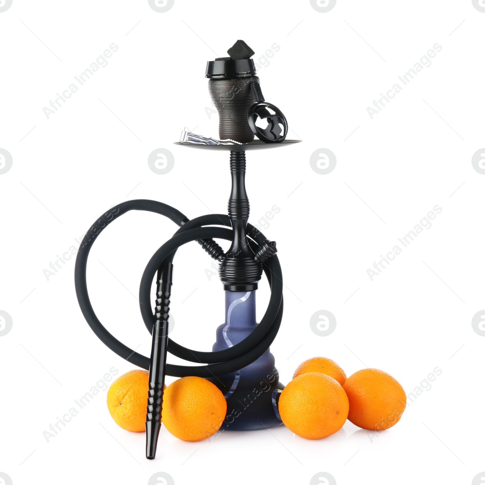 Photo of Dark traditional hookah and oranges isolated on white
