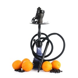 Photo of Dark traditional hookah, oranges and black currants isolated on white