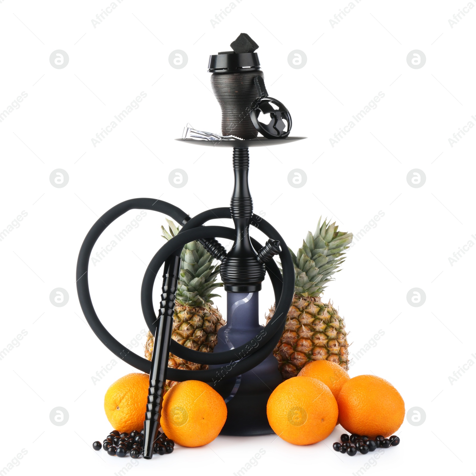 Photo of Dark traditional hookah, pineapples, oranges and black currants isolated on white