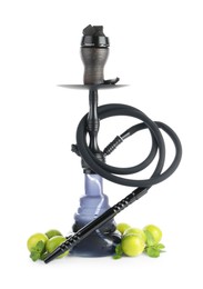 Photo of Dark traditional hookah, limes and mint isolated on white