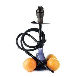 Photo of Dark traditional hookah and grapefruits isolated on white