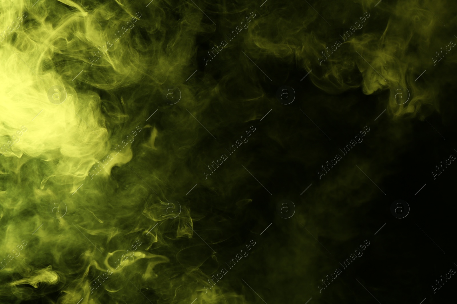 Photo of Hookah smoke in yellow light on black background, closeup