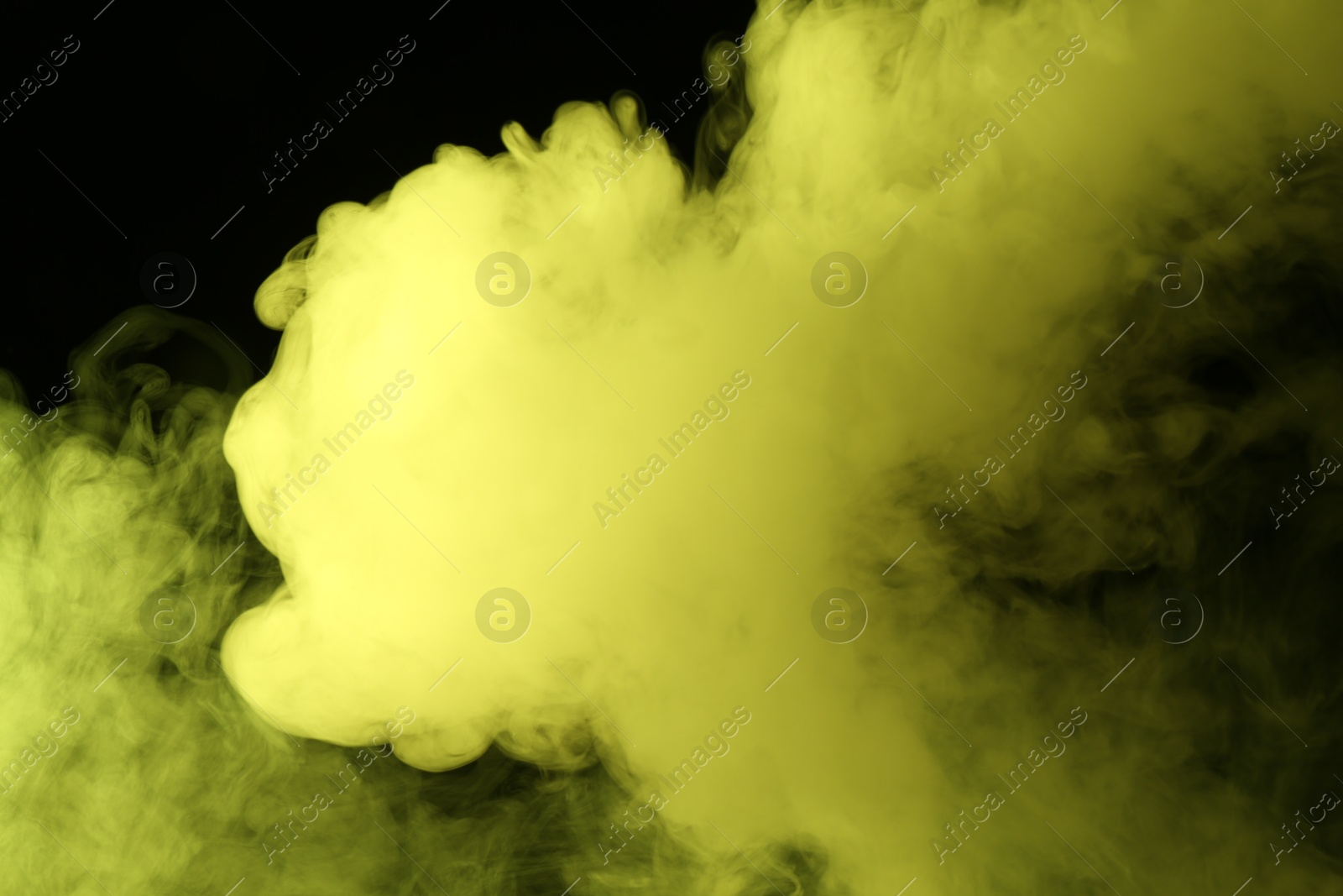Photo of Hookah smoke in yellow light on black background, closeup