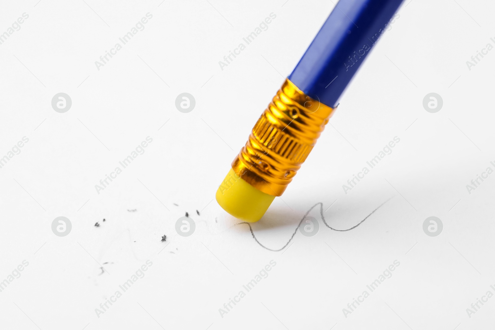 Using pencil with eraser on white background, closeup Photo of Using pencil with eraser on white background, closeup