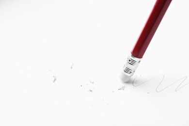 Photo of Using pencil with eraser on white background, closeup. Space for text
