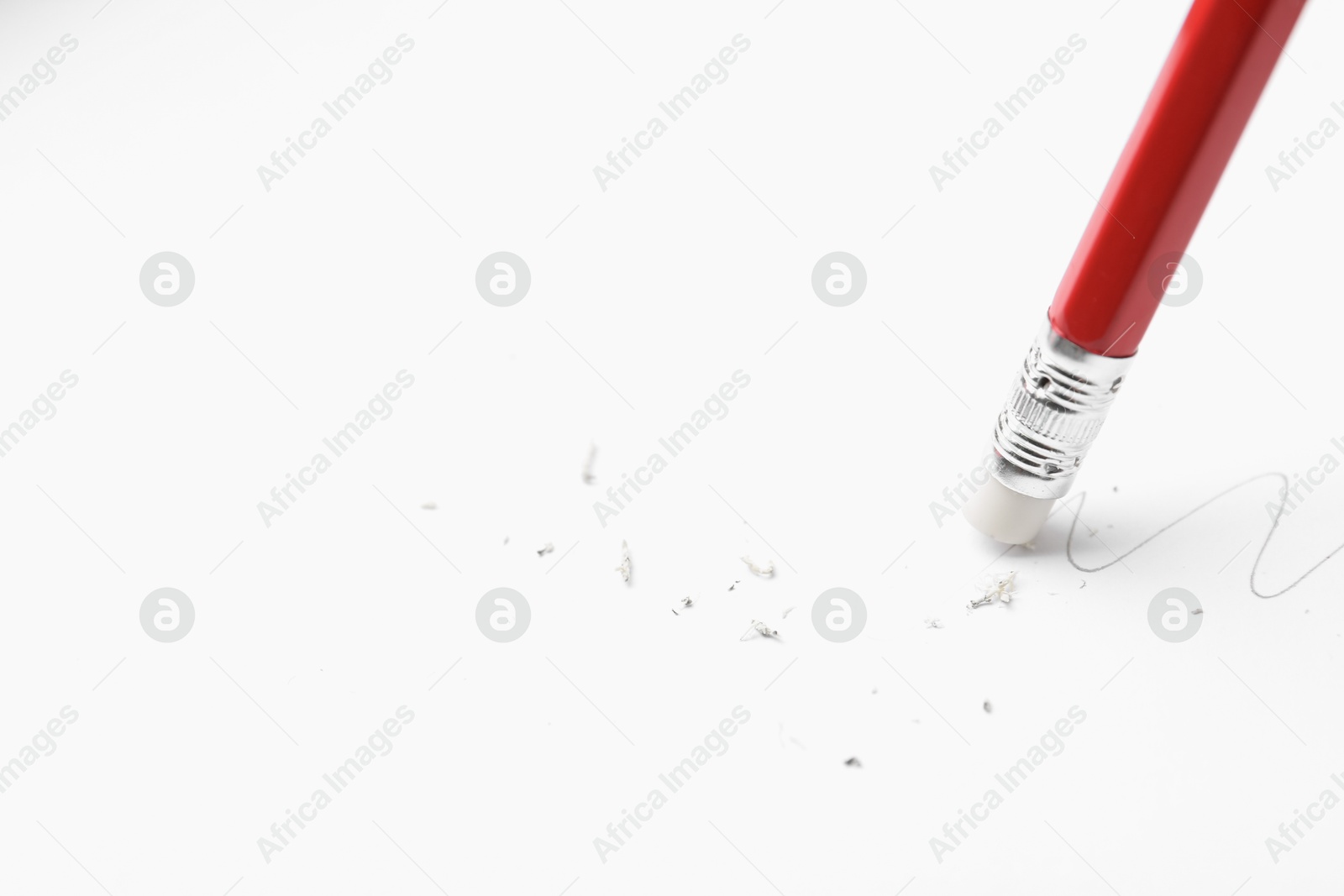 Using pencil with eraser on white background, closeup. Space for text Photo of Using pencil with eraser on white background, closeup. Space for text