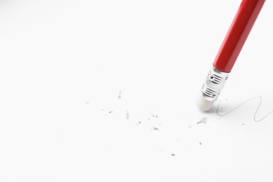 Photo of Using pencil with eraser on white background, closeup. Space for text