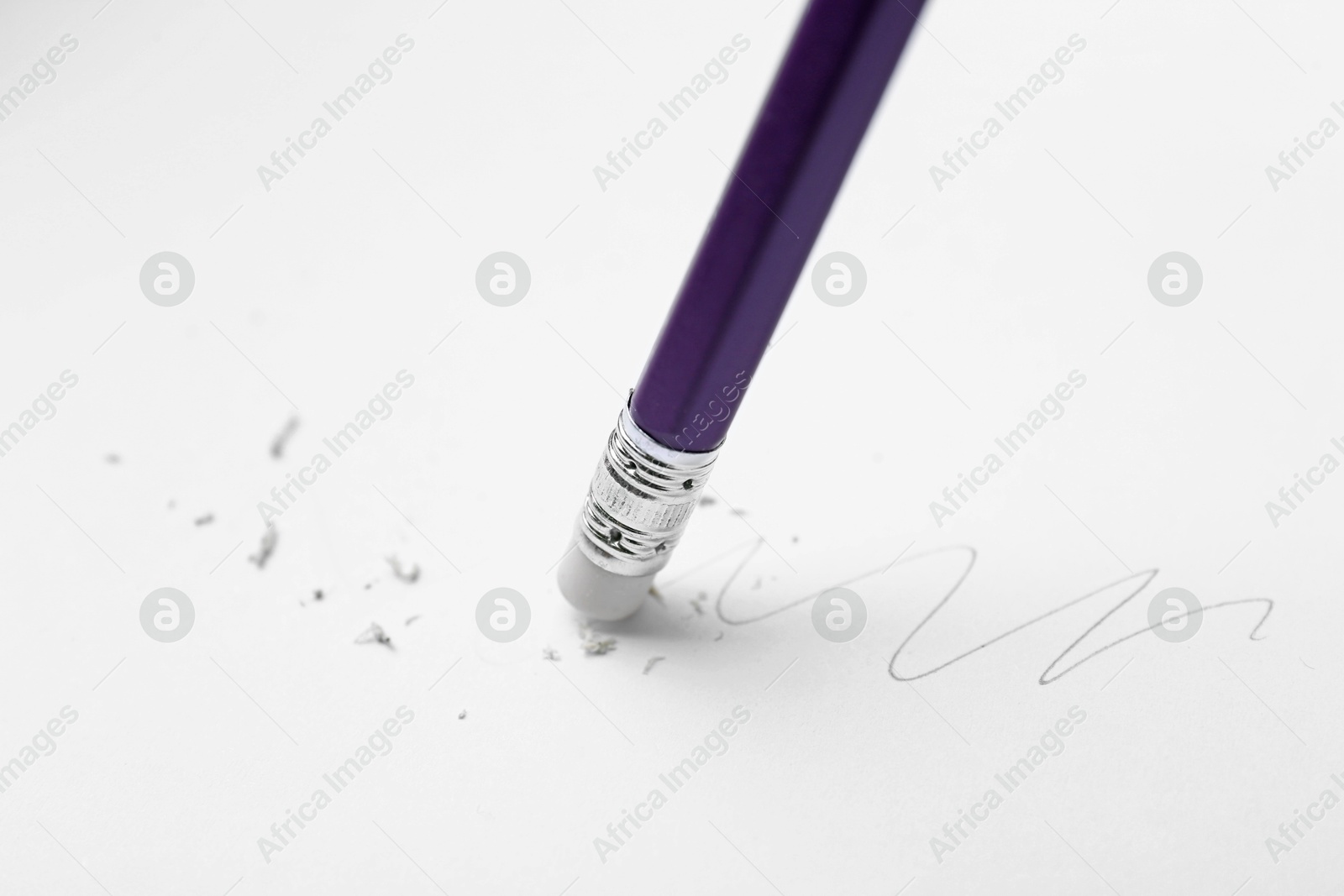 Using pencil with eraser on white background, closeup Photo of Using pencil with eraser on white background, closeup