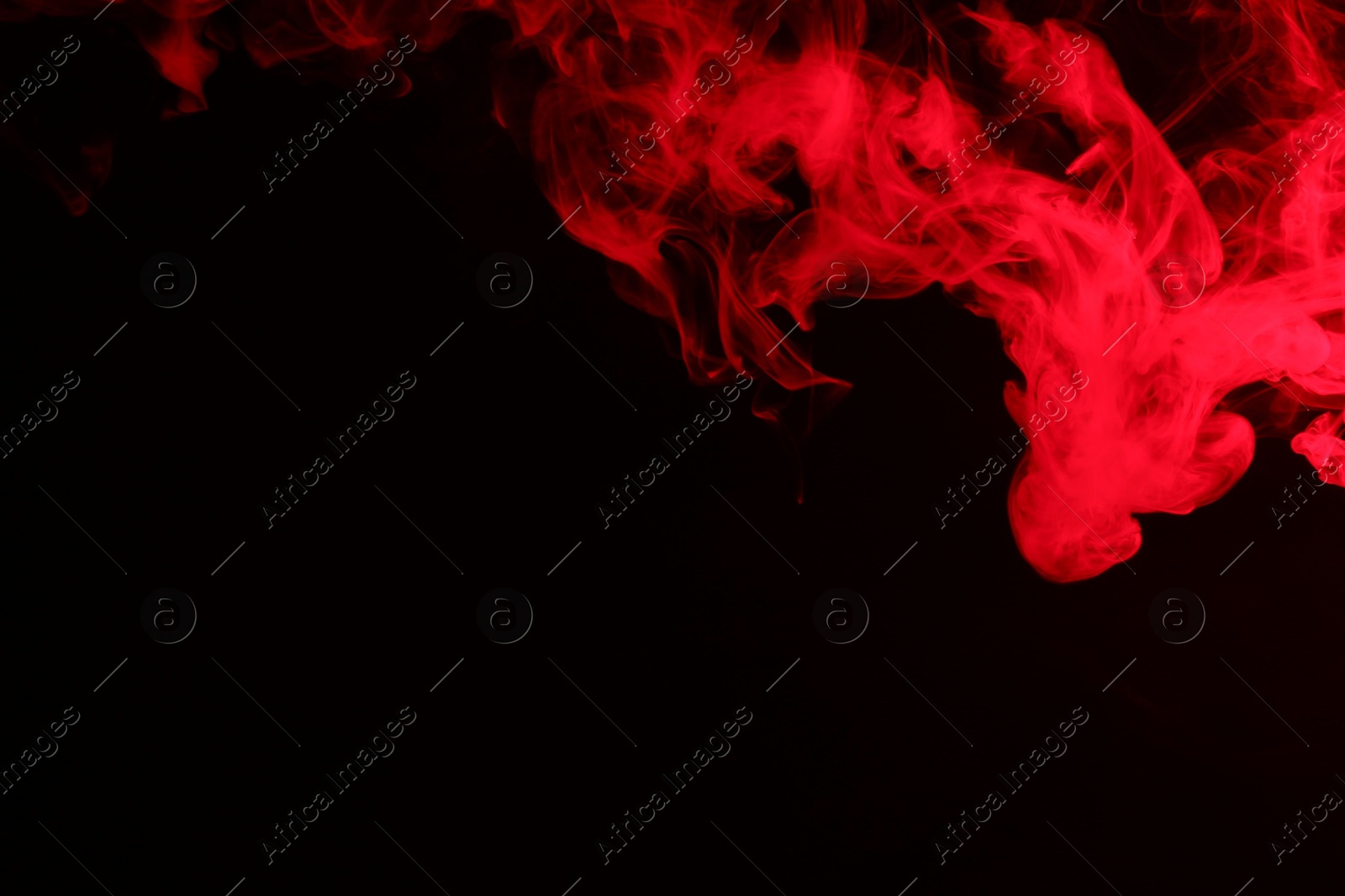 Photo of Hookah smoke in red light on black background, closeup. Space for text