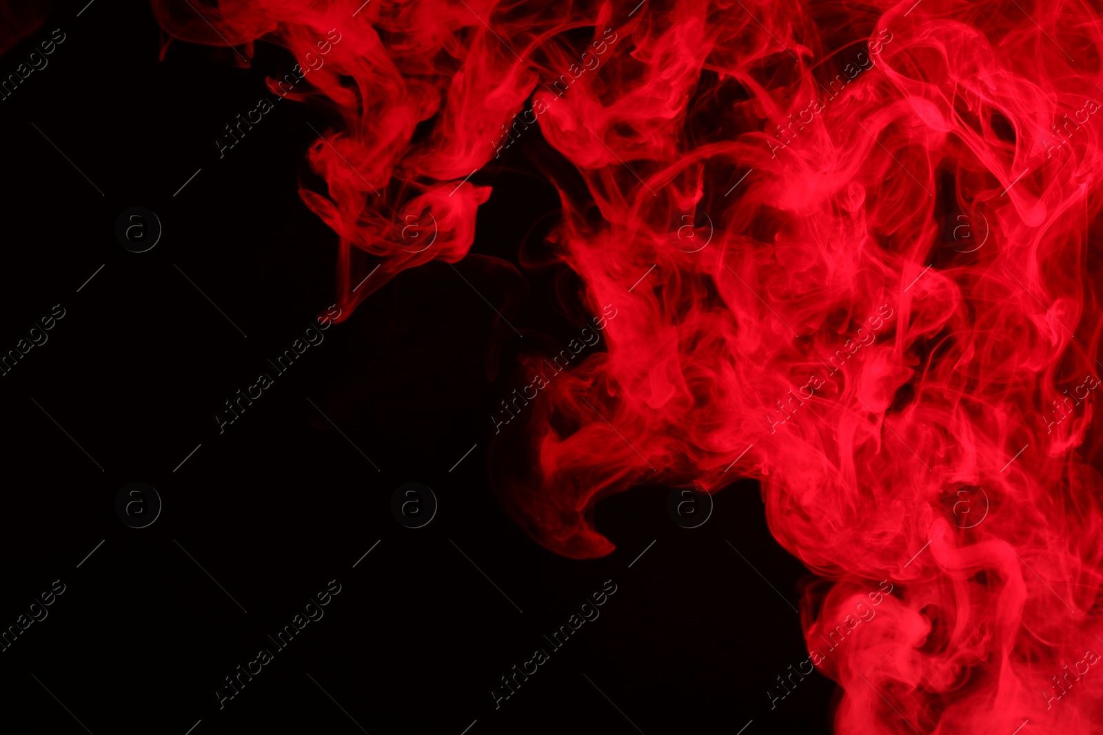 Photo of Hookah smoke in red light on black background, closeup. Space for text