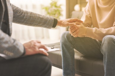 Image of Psychologist working with client in office, closeup
