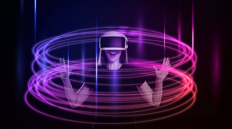 Image of Woman using virtual reality headset on black background. Bright neon lines around her