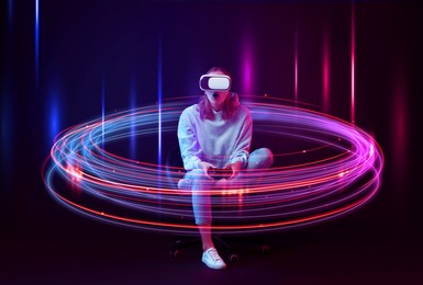 Image of Woman using virtual reality headset and controller against dark background. Bright neon lines around her